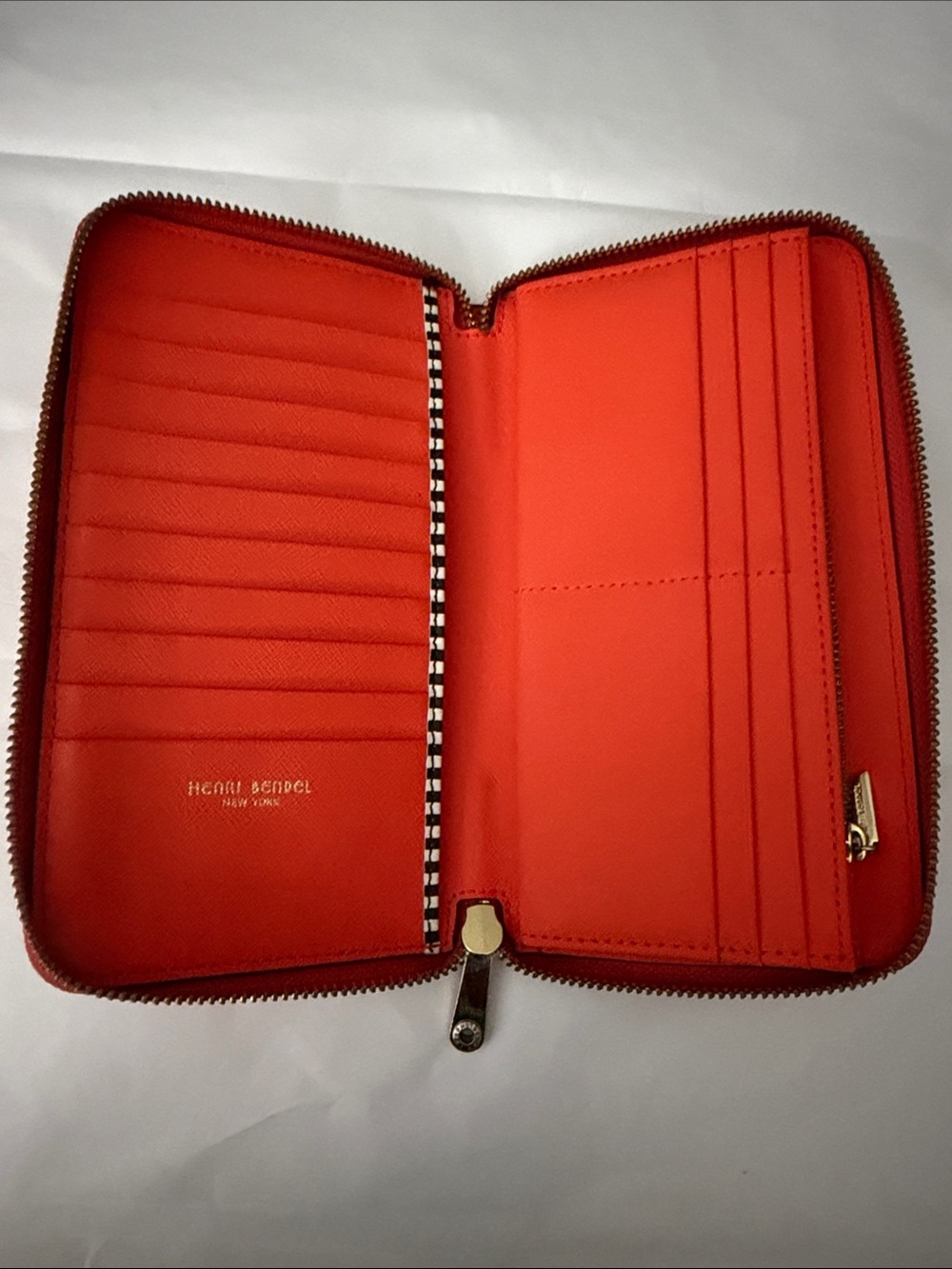 henri bendel orange zip-around leather wallet with card slots